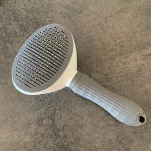 Recibido Cepillo de Limpieza Automática para Eliminación de Pelo de Perro del cliente D****n.